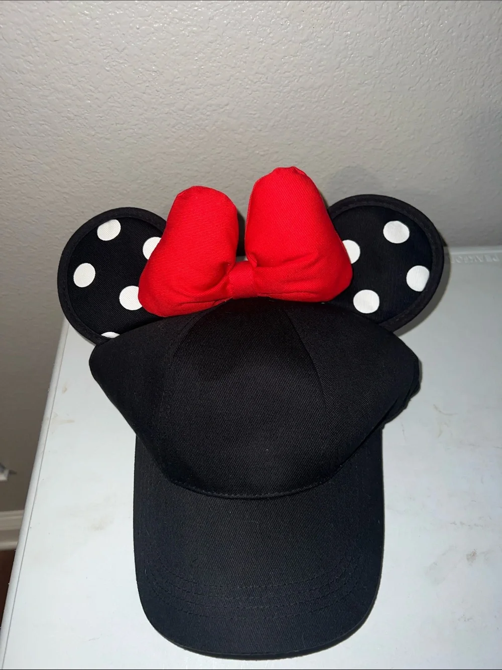 Disney Black Minnie Mouse Ear Hat with Red Bow and White Polka Dots
